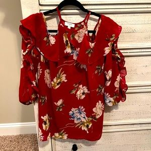 Umgee open shoulder semi sheer long sleeve top.